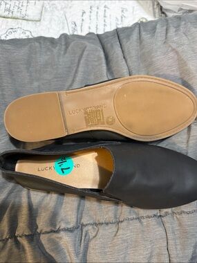 Lucky Brand Black Slip-On Flats with Tan Sole